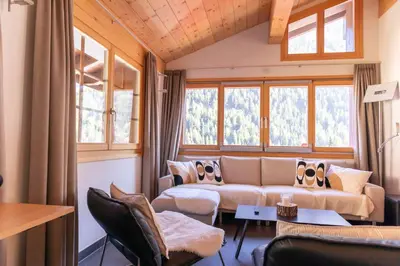 Ein Sitzbereich in der Unterkunft ESCAPE Chalets