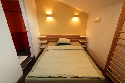 Ein Bett oder Betten in einem Zimmer der Unterkunft Dans ma bulle