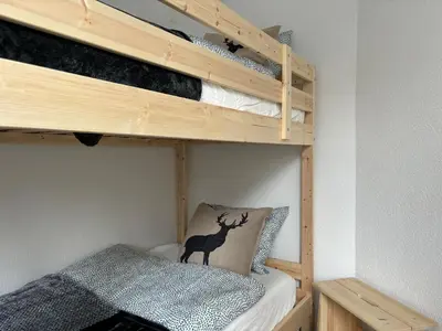 Ein Bett oder Betten in einem Zimmer der Unterkunft Chalet Lärchenheim, central SaasFee close to AlpinExpress