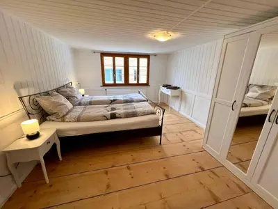 Ein Bett oder Betten in einem Zimmer der Unterkunft Chalet im Wallis