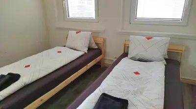 Ein Bett oder Betten in einem Zimmer der Unterkunft ganzes Haus für dich 20min bis nach Interlaken und Adelboden