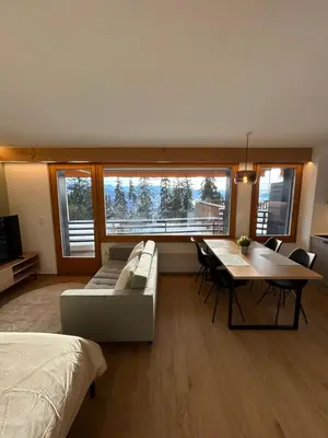 Ein Bett oder Betten in einem Zimmer der Unterkunft Studio moderne et cosy avec piscine et sauna