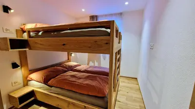 Ein Bett oder Betten in einem Zimmer der Unterkunft Silberdistel Brand-new luxury apartment with private terrace