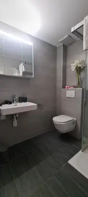 Ein Badezimmer in der Unterkunft Hotel Garni