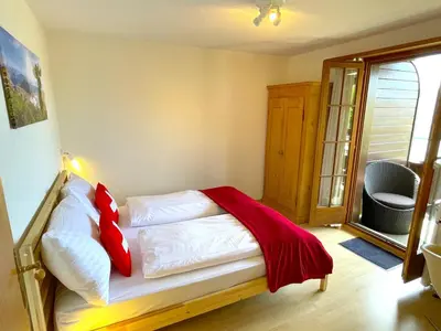 Ein Bett oder Betten in einem Zimmer der Unterkunft Concierge with Scenic Views and Long Stay by SwissHut