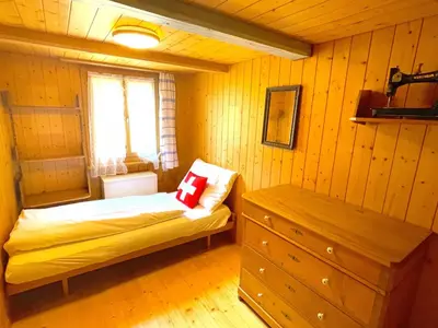 Ein Bett oder Betten in einem Zimmer der Unterkunft Lake Thun Alps Scenic Views and Concierge by SwissHut