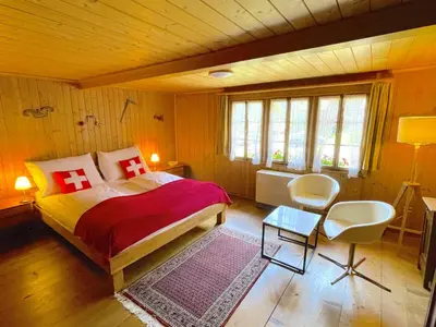 Ein Bett oder Betten in einem Zimmer der Unterkunft Lake Thun Alps Scenic Views and Concierge by SwissHut