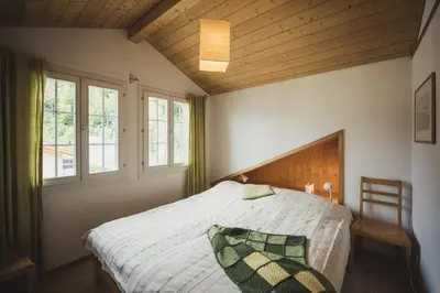 Ein Bett oder Betten in einem Zimmer der Unterkunft Top floor flat with lake view and balcony