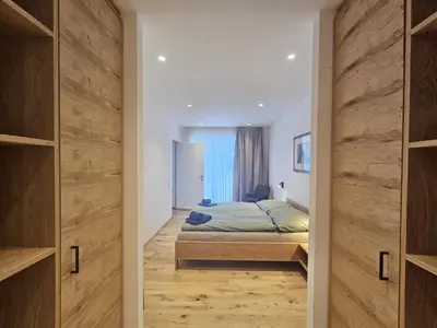 Ein Bett oder Betten in einem Zimmer der Unterkunft Silberdistel EG