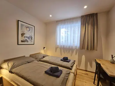 Ein Bett oder Betten in einem Zimmer der Unterkunft Silberdistel EG