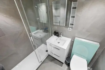 Ein Badezimmer in der Unterkunft Studio chalet rénové au centre de la ville