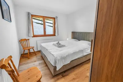 Ein Bett oder Betten in einem Zimmer der Unterkunft Appartement ski aux pieds - domaine des 4 Vallées