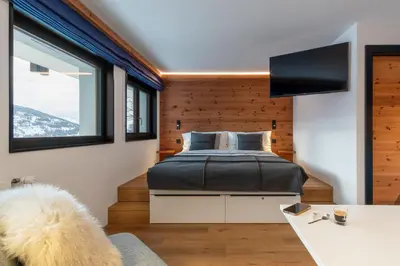 Ein Bett oder Betten in einem Zimmer der Unterkunft Studio Les Bouleaux - 1 lit - 3 pers