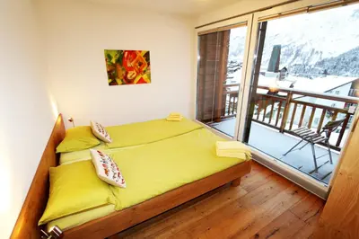 Ein Bett oder Betten in einem Zimmer der Unterkunft Symbiose