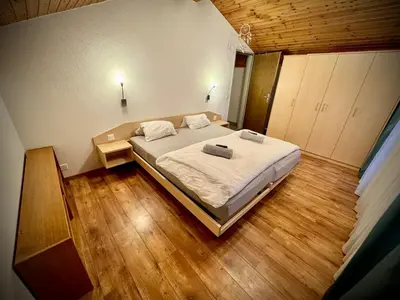 Ein Bett oder Betten in einem Zimmer der Unterkunft Zentrale Wohnung mit 3 Zimmern