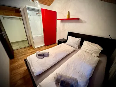 Ein Bett oder Betten in einem Zimmer der Unterkunft Zentrale Wohnung mit 3 Zimmern