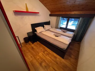 Ein Bett oder Betten in einem Zimmer der Unterkunft Zentrale Wohnung mit 3 Zimmern
