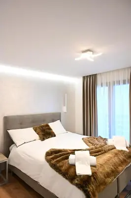 Ein Bett oder Betten in einem Zimmer der Unterkunft Crans Montana-Snow island