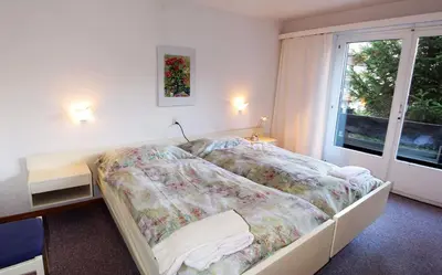Ein Bett oder Betten in einem Zimmer der Unterkunft Amici