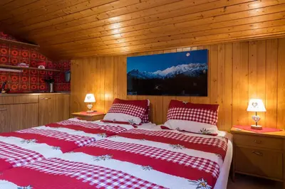 Ein Bett oder Betten in einem Zimmer der Unterkunft Haus Alpenblick