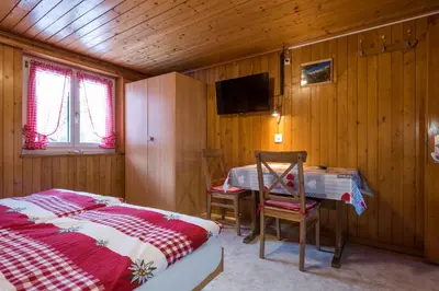 Ein Bett oder Betten in einem Zimmer der Unterkunft Haus Alpenblick