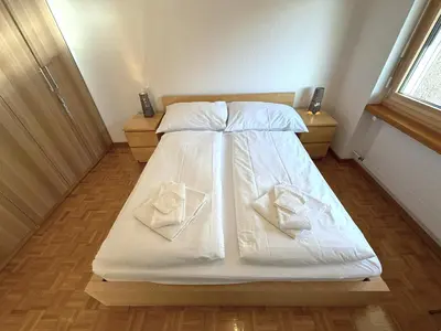 Ein Bett oder Betten in einem Zimmer der Unterkunft Schwarzhorn 3- komplett renoviert, tolle Aussicht!