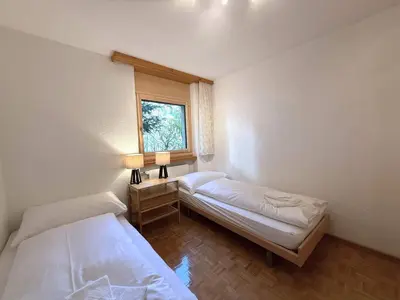 Ein Bett oder Betten in einem Zimmer der Unterkunft Schwarzhorn 3- komplett renoviert, tolle Aussicht!