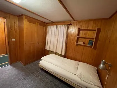 Ein Bett oder Betten in einem Zimmer der Unterkunft Long & Short Stay Hotel Bahnhof Ausserberg