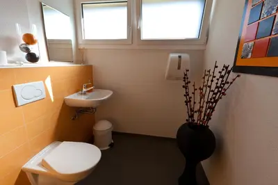 Ein Badezimmer in der Unterkunft Hotel Garni Simplon