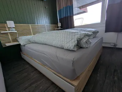 Ein Bett oder Betten in einem Zimmer der Unterkunft Ski-In, ski-out Thyon