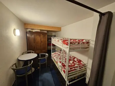Ein Bett oder Betten in einem Zimmer der Unterkunft Appartement à 100m des pistes de ski et des commodités