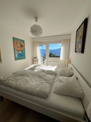 Ein Bett oder Betten in einem Zimmer der Unterkunft Cozy apartment with stunning view