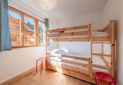 Ein Bett oder Betten in einem Zimmer der Unterkunft Panoramapark Soleil E 3