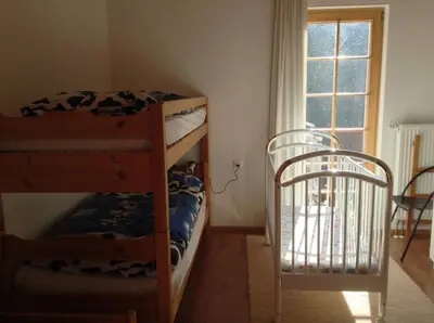Ein Bett oder Betten in einem Zimmer der Unterkunft Gorgeous Chalet in Truttli Area of Lauenen