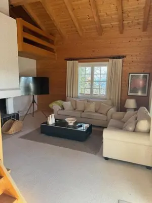 Ein Sitzbereich in der Unterkunft Chalet cosy avec vue sublime