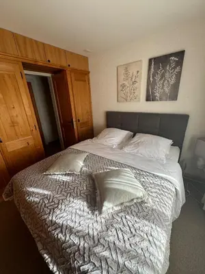 Ein Bett oder Betten in einem Zimmer der Unterkunft Chalet cosy avec vue sublime