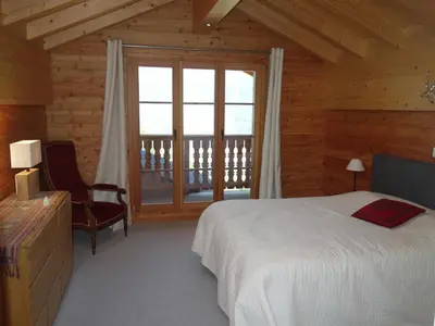 Ein Bett oder Betten in einem Zimmer der Unterkunft Chalet in Les Masses with ski storage