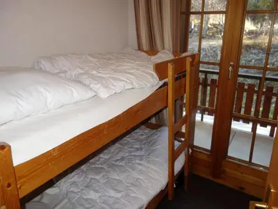 Ein Bett oder Betten in einem Zimmer der Unterkunft Apartment with balcony in Veysonnaz