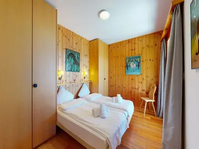Ein Bett oder Betten in einem Zimmer der Unterkunft Chalet in Veysonnaz with swimming pool