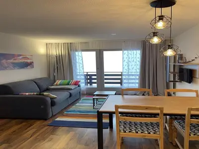 Ein Sitzbereich in der Unterkunft Charming apartment with hill view