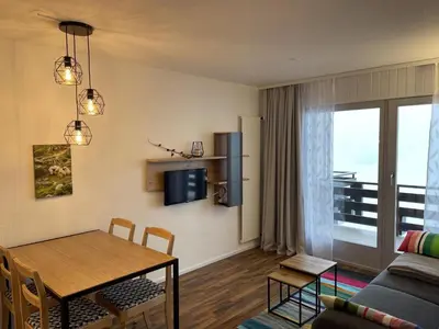 Ein Sitzbereich in der Unterkunft Charming apartment with hill view