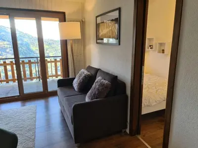 Ein Sitzbereich in der Unterkunft Flat in Veysonnaz near Ski Lift & Valley Views