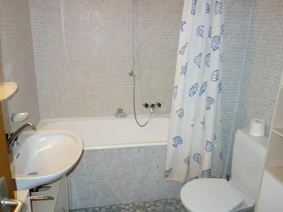 Ein Badezimmer in der Unterkunft Centrally-located apartment in Veysonnaz