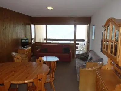 Ein Sitzbereich in der Unterkunft Centrally-located apartment in Veysonnaz