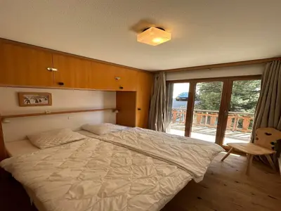 Ein Bett oder Betten in einem Zimmer der Unterkunft Apartment in Swiss Alps near Cable Car