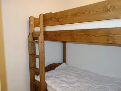 Ein Bett oder Betten in einem Zimmer der Unterkunft Pleasant apartment in Versonnaz