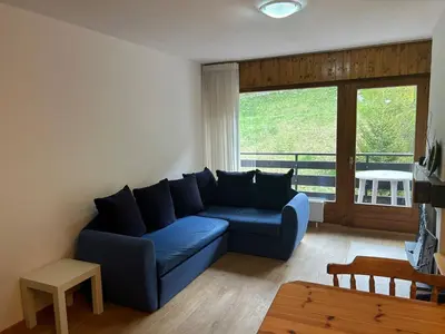 Ein Sitzbereich in der Unterkunft Modern apartment near ski area