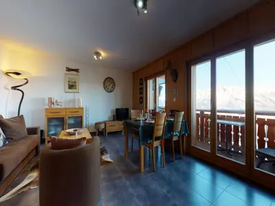 Ein Sitzbereich in der Unterkunft Apartment in Veysonnaz with Ski-In Ski-Out