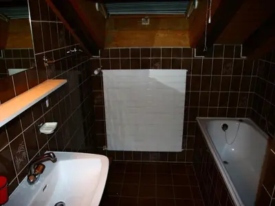 Ein Badezimmer in der Unterkunft Family apartment with terrace
