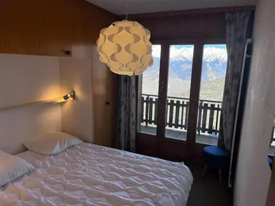 Ein Bett oder Betten in einem Zimmer der Unterkunft Apartment in Veysonnaz with Stunning Views